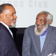 Dick Gregory, right, introduces honoree Joe Madison of Sirius XM at a Capital Press Club gala in Washington in 2014. (Capital Press Club)